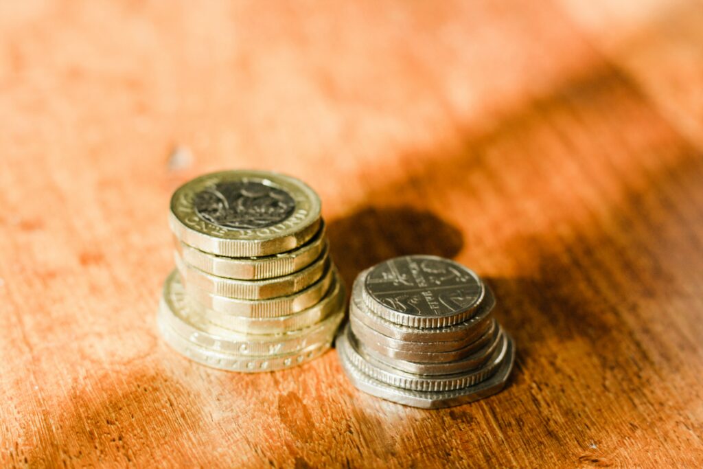 Some coins stacked on a table