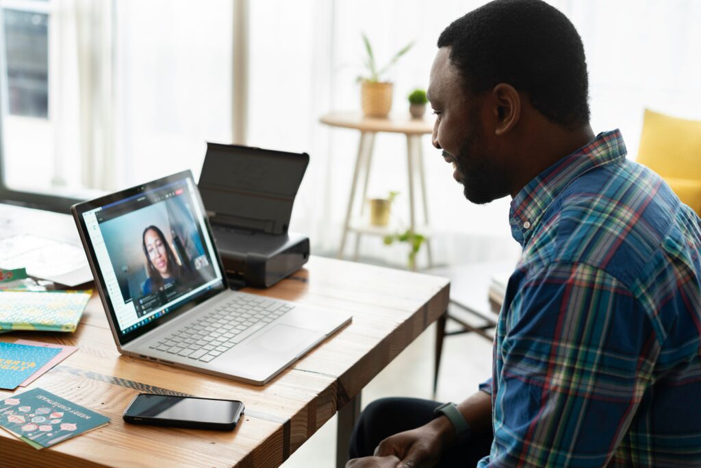 An online coach checking in on a client virtually
