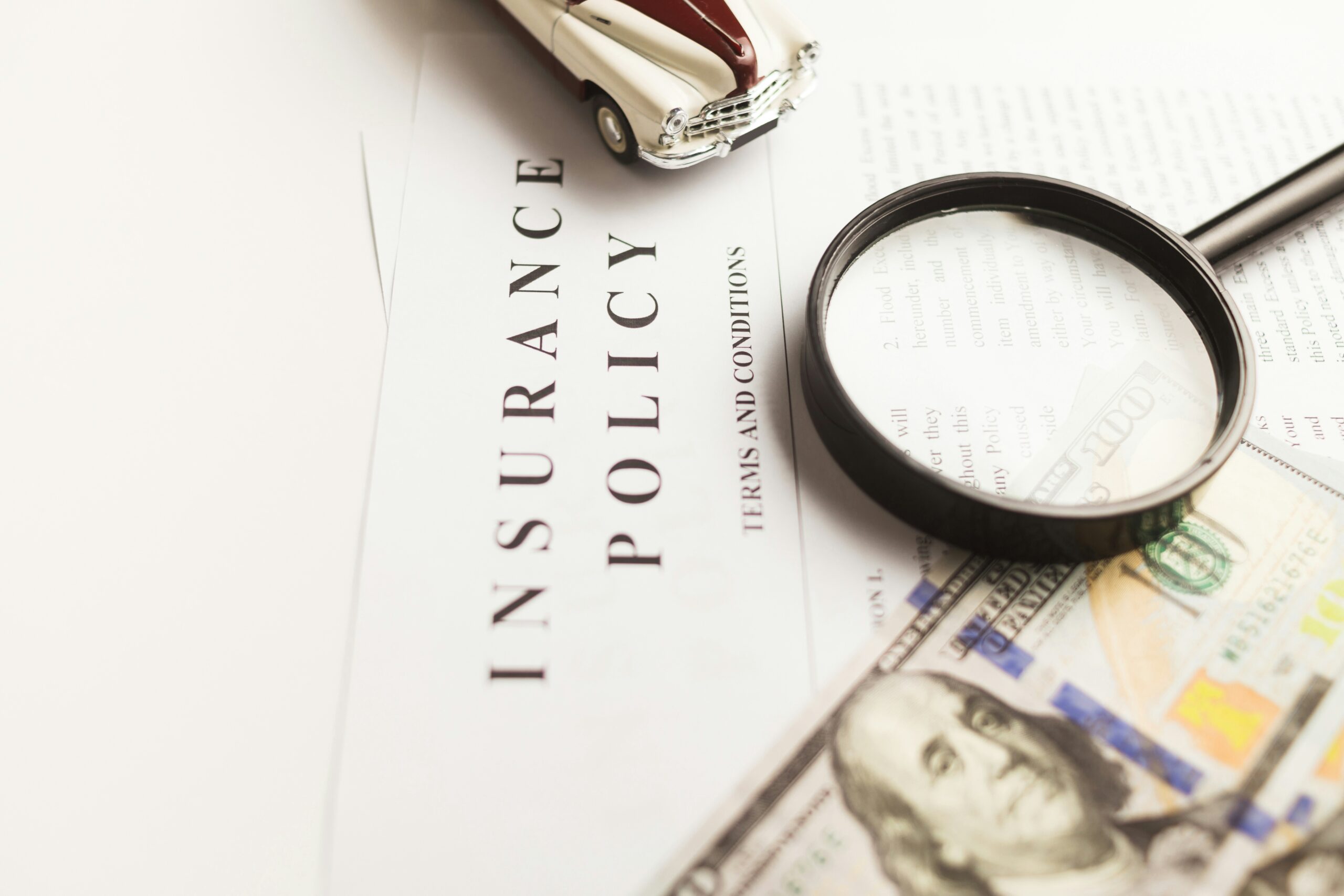 A sheet of paper with the words "Insurance policy"